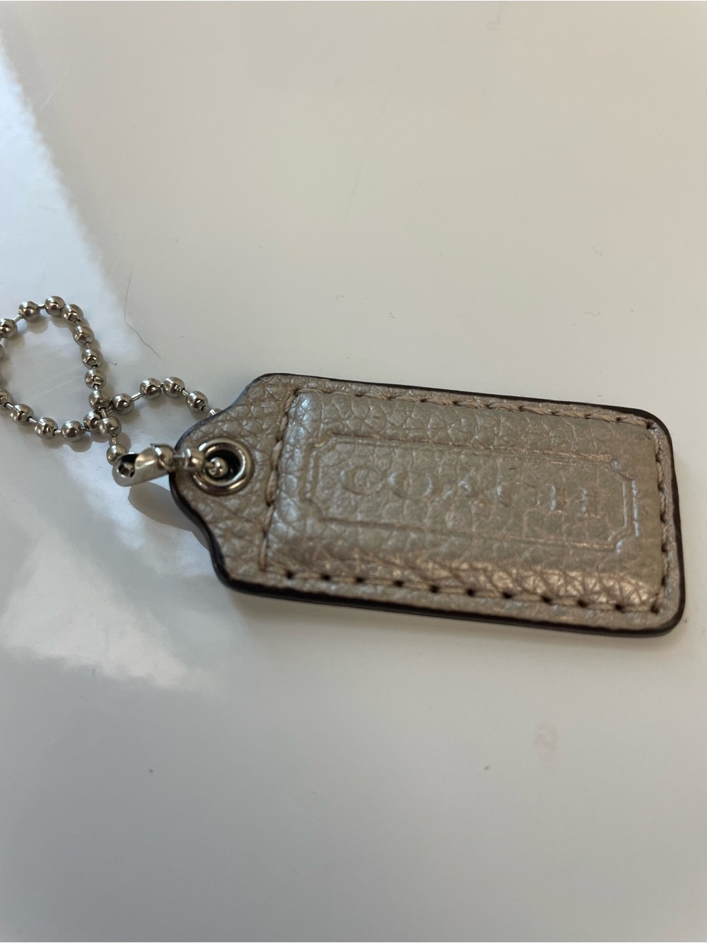 Coach Metallic Silver Leather Bag Charm Tag